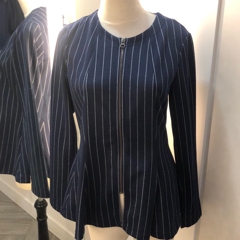 A striped blue and white zip up